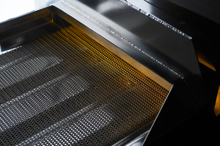 BTU controlled atmosphere belt furnace.